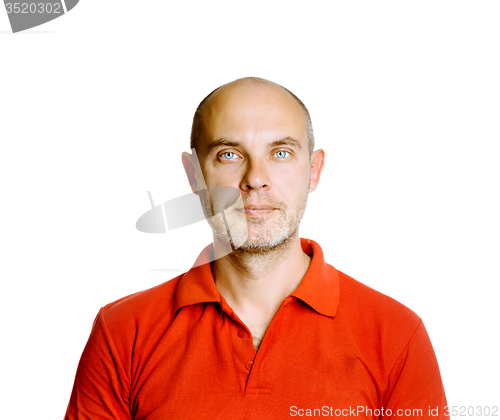 Image of Unshaven tranquil middle-aged man in a red T-shirt. Studio. isol