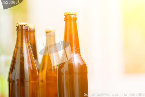 Image of Close up of beer bottles