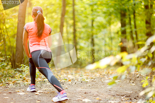 Image of woman doing stretching exercise