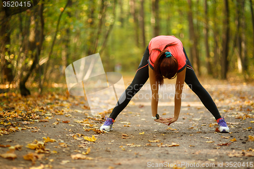 Image of woman doing stretching exercise