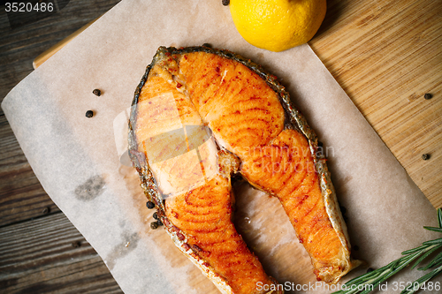 Image of Grilled red fish steak salmon and lemon