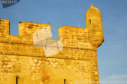 Image of  brick in old   and   the tower near sky