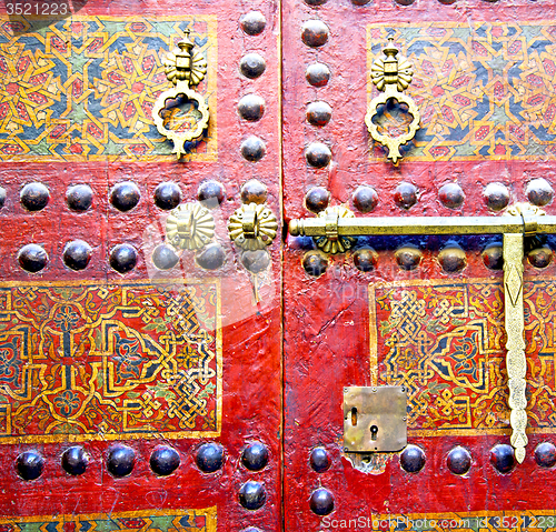 Image of metal rusty  brown    morocco in africa the old wood  facade hom