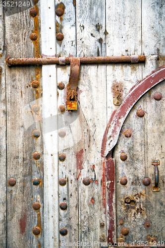 Image of rusty  brown   in africa the   home and safe padlock 