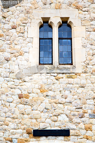 Image of old windon in   glass the wall 