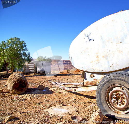 Image of water tank in morocco africa tree