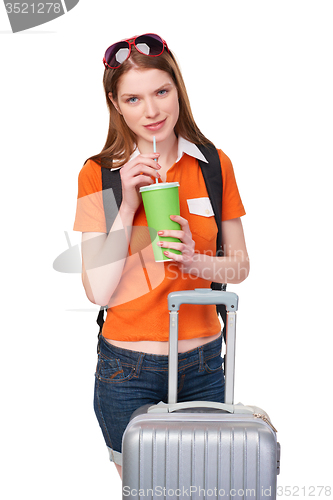 Image of Smiling girl with backpack and suitcase