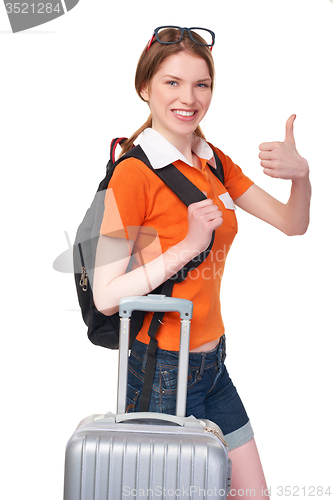 Image of Smiling girl with backpack and suitcase