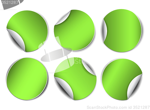 Image of Set of green round promotional stickers.