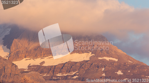 Image of Mist over the snowy mountains