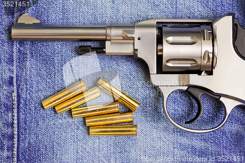 Image of revolver with cartridges