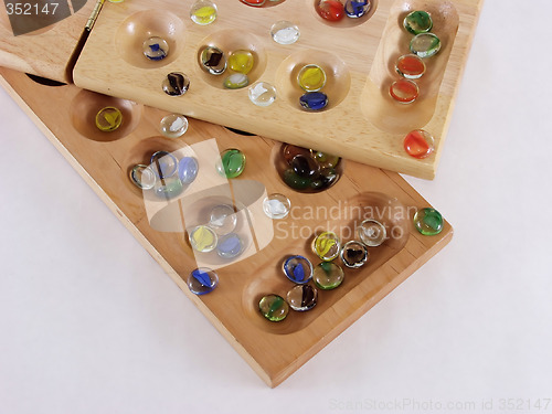 Image of Two Mancala boards, overlap