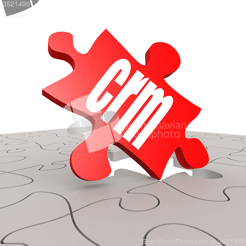 Image of CRM word with puzzle background