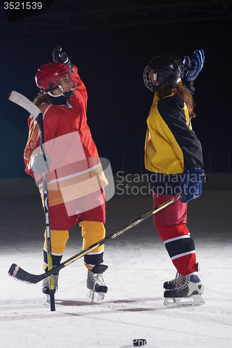 Image of teen girls ice hockey players portrait