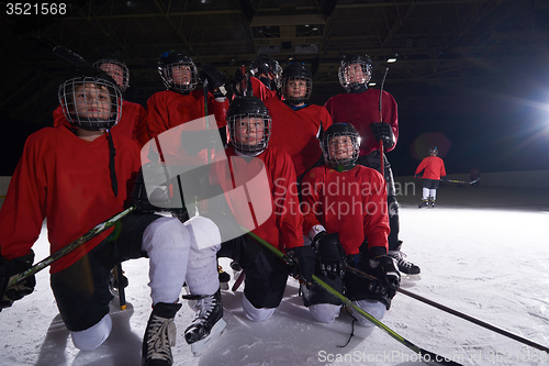 Image of happy children gropu  hockey team sport players