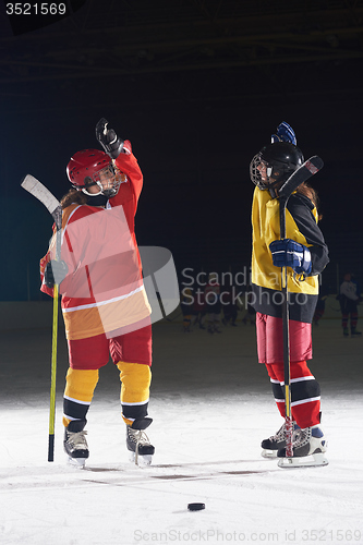 Image of teen girls ice hockey players portrait