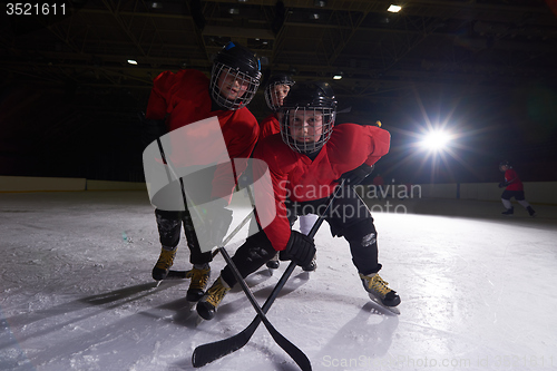 Image of happy children gropu  hockey team sport players