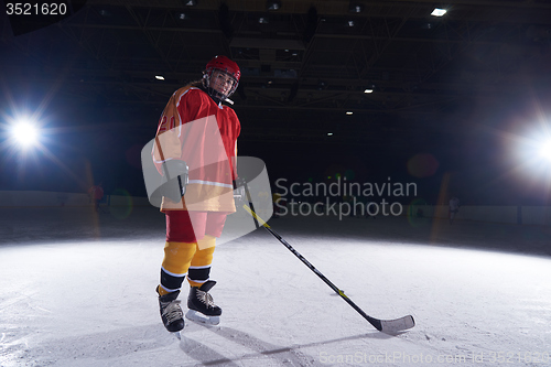 Image of teen girl  ice hockey player portrait