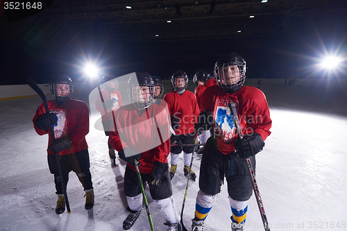 Image of happy children gropu  hockey team sport players