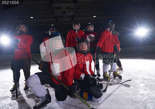 Image of happy children gropu  hockey team sport players