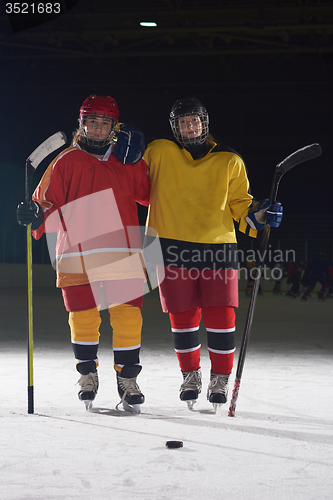 Image of teen girls ice hockey players portrait