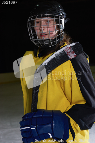 Image of teen girl  ice hockey player portrait