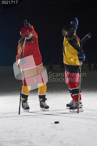 Image of teen girls ice hockey players portrait