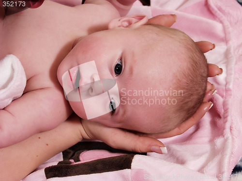 Image of Cradling Baby's Head