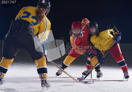 Image of teen ice hockey sport  players in action