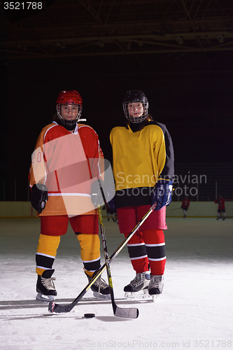 Image of teen girls ice hockey players portrait