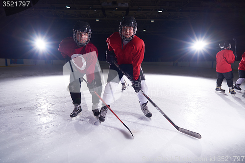 Image of happy children gropu  hockey team sport players