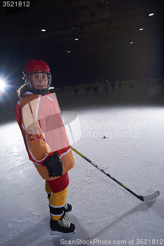 Image of teen girl  ice hockey player portrait