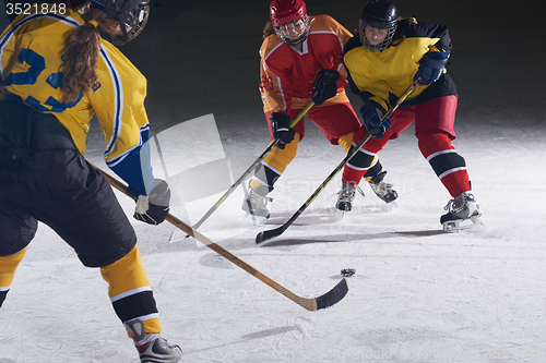 Image of teen ice hockey sport  players in action