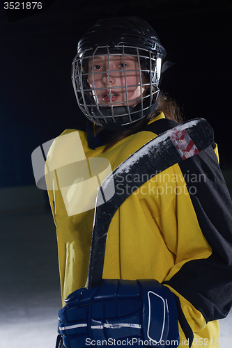 Image of teen girl  ice hockey player portrait