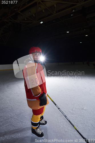 Image of teen girl  ice hockey player portrait