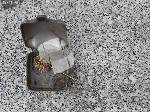 Image of Holy water shell at the grave