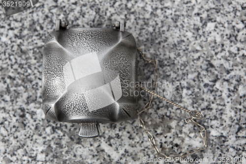 Image of Holy water shell at the grave