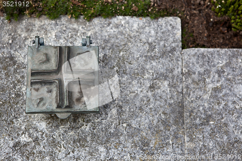 Image of Holy water shell at the grave