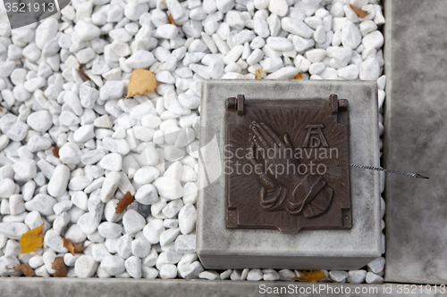 Image of Holy water shell at the grave