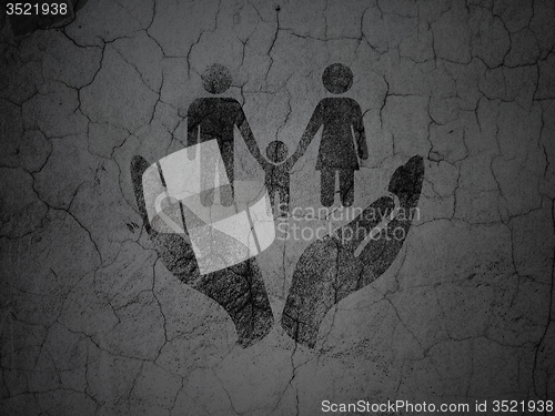 Image of Insurance concept: Family And Palm on grunge wall background