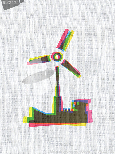 Image of Industry concept: Windmill on fabric texture background