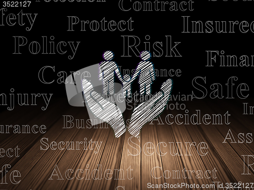 Image of Insurance concept: Family And Palm in grunge dark room