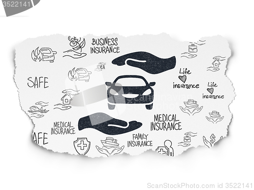 Image of Insurance concept: Car And Palm on Torn Paper background