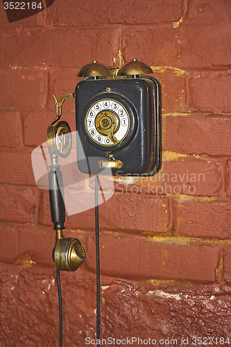 Image of Old phone on the wall