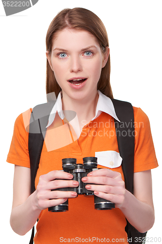 Image of Teen girl looking through binoculars