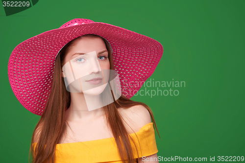 Image of Closeup portrait of woman in straw hat