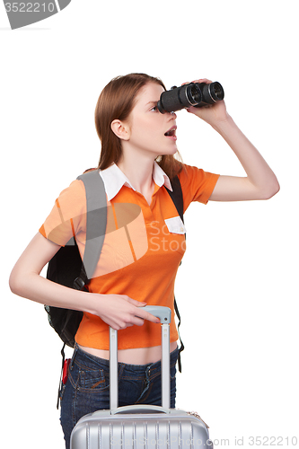 Image of Teen girl looking through binoculars