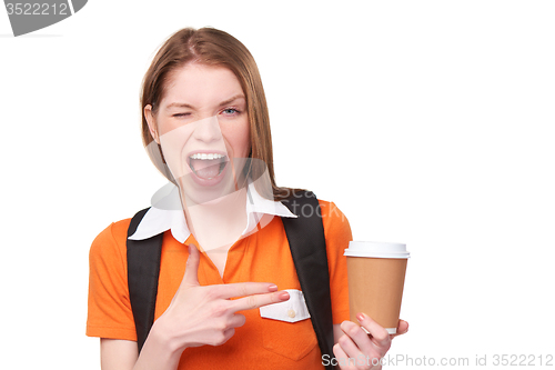 Image of Teen girl holding disposable paper cup