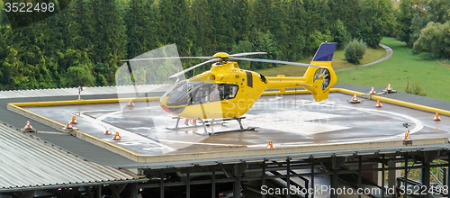 Image of yellow helicopter