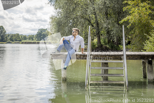 Image of man at the lake